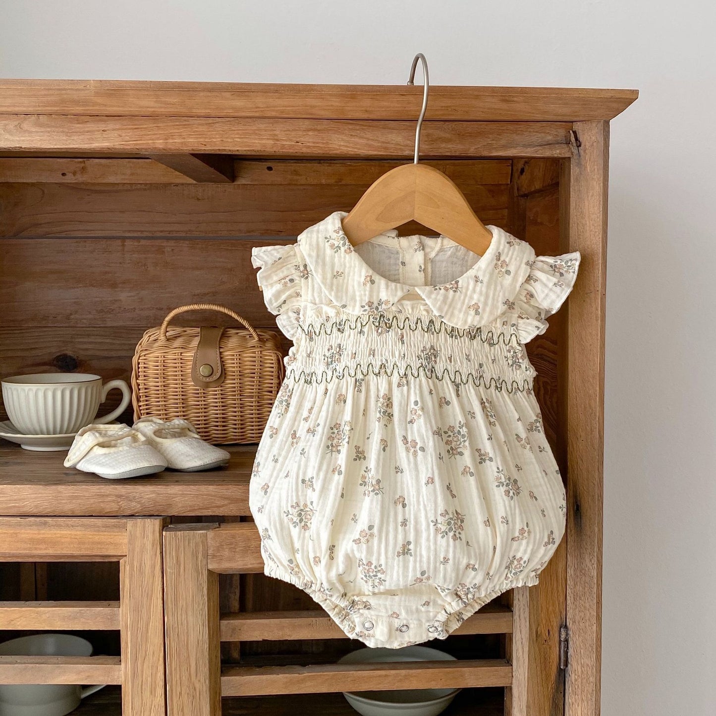 BABY IVORY FLORAL SHORT SLEEVE ROMPER